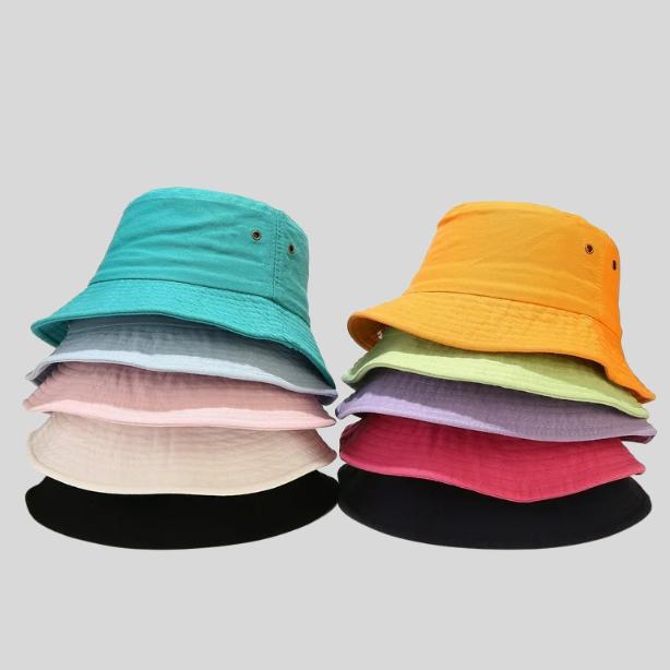 Custom embroidered bucket hats in assorted colours and fabrics